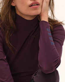 Cunsul Long Sleeve Turtleneck Top in Dark Grape