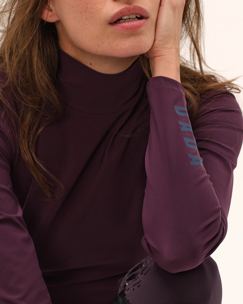 Cunsul Long Sleeve Turtleneck Top in Dark Grape